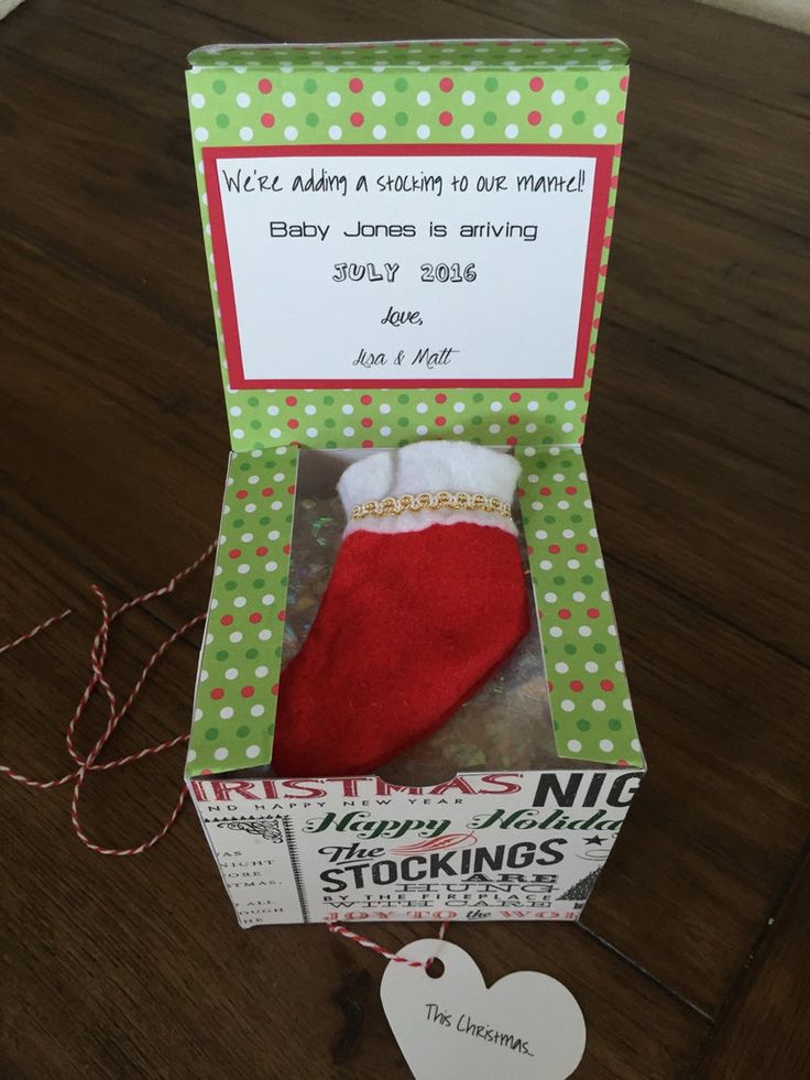 an origami christmas stocking in a box