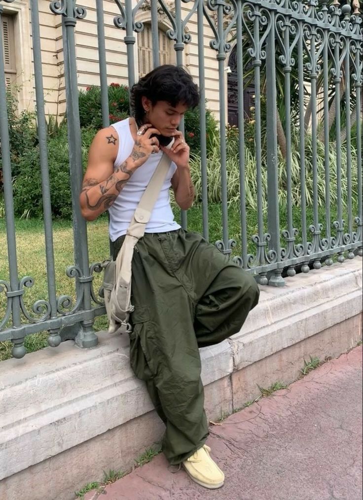 green outfit inspo, parachute pants, outfit inspo, streetwear, inspo, mens fashion Guy Outfit Ideas Aesthetic, Guys In Streetwear, Picknick Outfit Men, Mens Baggy Street Style, Y2k Skater Outfits Men, Campy Fashion Men, Stylish Guy Outfits, Masc Fashion Aesthetic, Baggy Clothes Outfit Men Street Styles