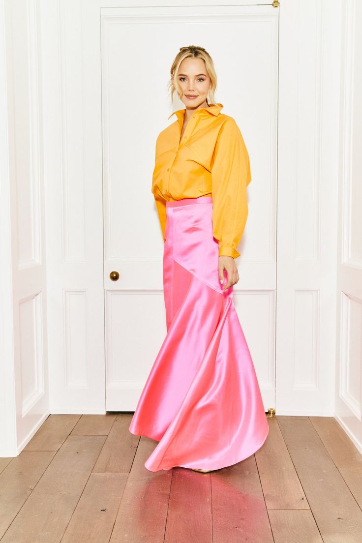 The perfect hue of neon pink that will make any outfit stand out. This pink silk skirt with side zip is a stunner in every way. MADE IN THE USA DRY CLEAN ONLY Chic Pink Maxi Skirt For Night Out, Pink Satin Skirt For Spring, Chic Pink Skirt For Cocktail, Chic Pink Lined Maxi Skirt, Chic Pink Flared Maxi Skirt, Pink Asymmetrical Skirt For Party, Pink Relaxed Maxi Skirt For Party, Chic Pink Pleated Skirt, Chic Relaxed Pink Skirt