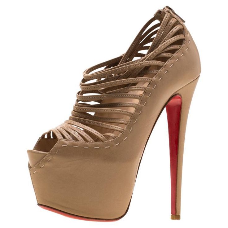 Christian Louboutin's Zoulou sandals are designed to elegantly frame the feet. Crafted from leather, the sandals feature multiple straps on the vamp, peep-toes, and 13.5 cm heels supported by platforms. The iconic red-sole of the brand makes it a notice-worthy pair. Includes: Original Dustbag High Heel Sandals Outfit, Shoes Heels Prom, Christian Louboutin Wedding, Nude Platform Heels, Christian Louboutin Flats, Century Shoes, Louboutin High Heels, Christian Louboutin Sneakers, Trendy High Heels