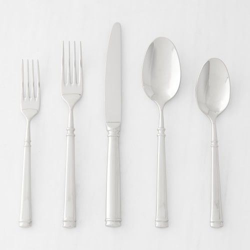 five forks, two spoons and one knife on a white surface