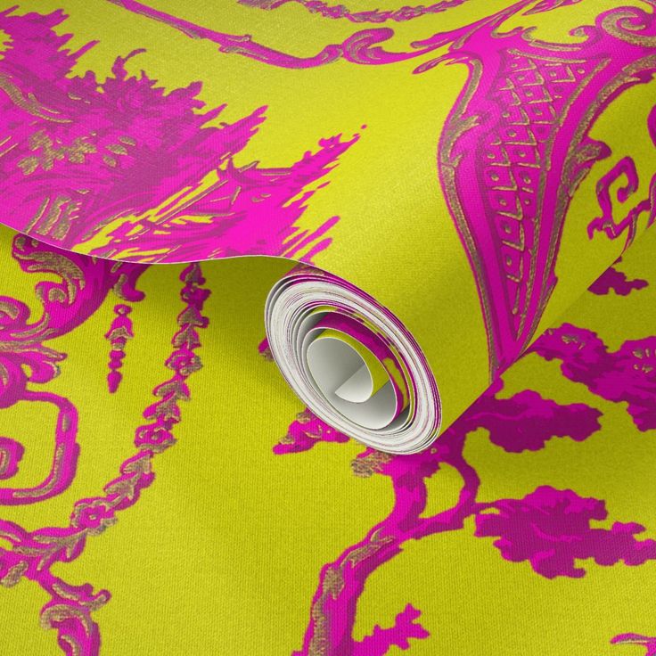 a bright pink and yellow wallpaper with an ornate design on the bottom half of it