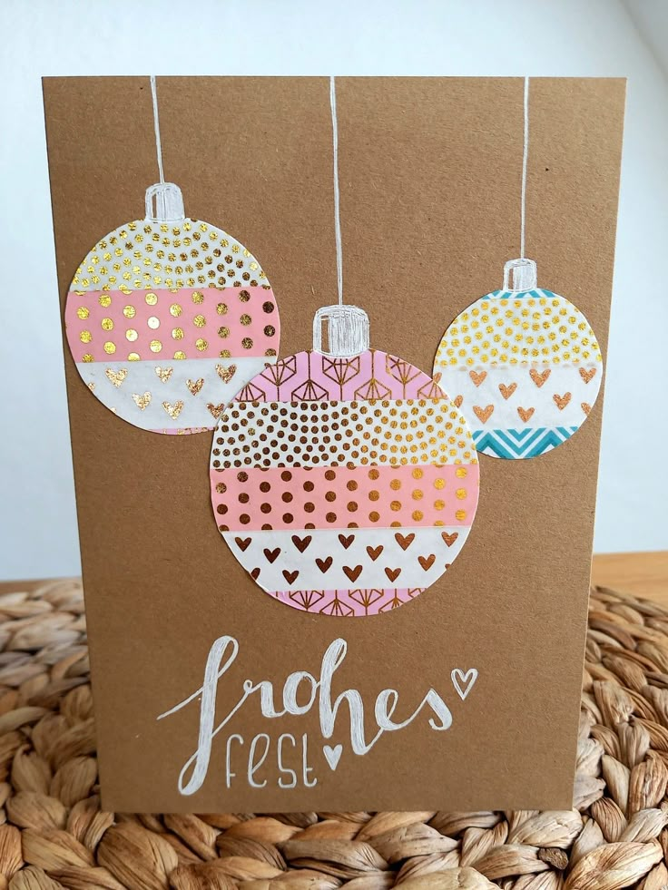 a card with some ornaments hanging from it