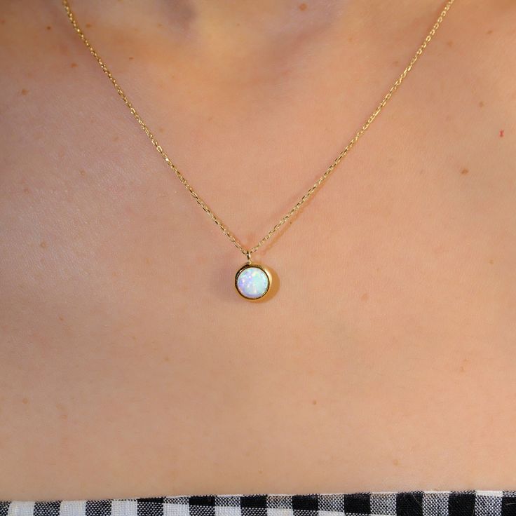 Solid Gold White Opal Pendant Necklace 🌟 Product Features 🌟 ⚖️ Weight: 2.10 Gr 🌈 Material Colors: Yellow Gold, Rose Gold, and White Gold 📏 Chain Length: 17 inch, 18 inch, 19 inch, 20 inch 🎁 Presentation: Shipped with a special box and bag 🔄 Returns: Right to return within 7 days ✨ Material and Color: Product color does not fade or darken 🛠️ Handcraftsmanship and Uniqueness: Handcrafted and may vary by 5% (+-) About White Opal White Opal is known for its captivating play-of-color, showcasi Opal Choker, Bezel Necklace, Real Rose, Opal Pendant Necklace, White Gold Chains, Opal White, Necklace White, Necklace Dainty, Opal Pendants