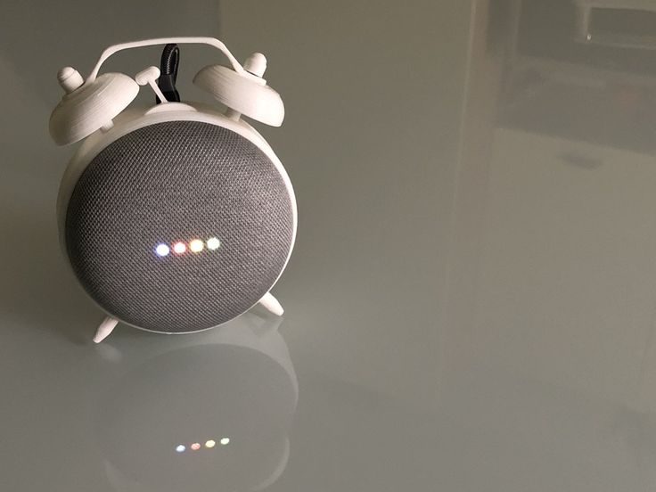 an alarm clock sitting on top of a table