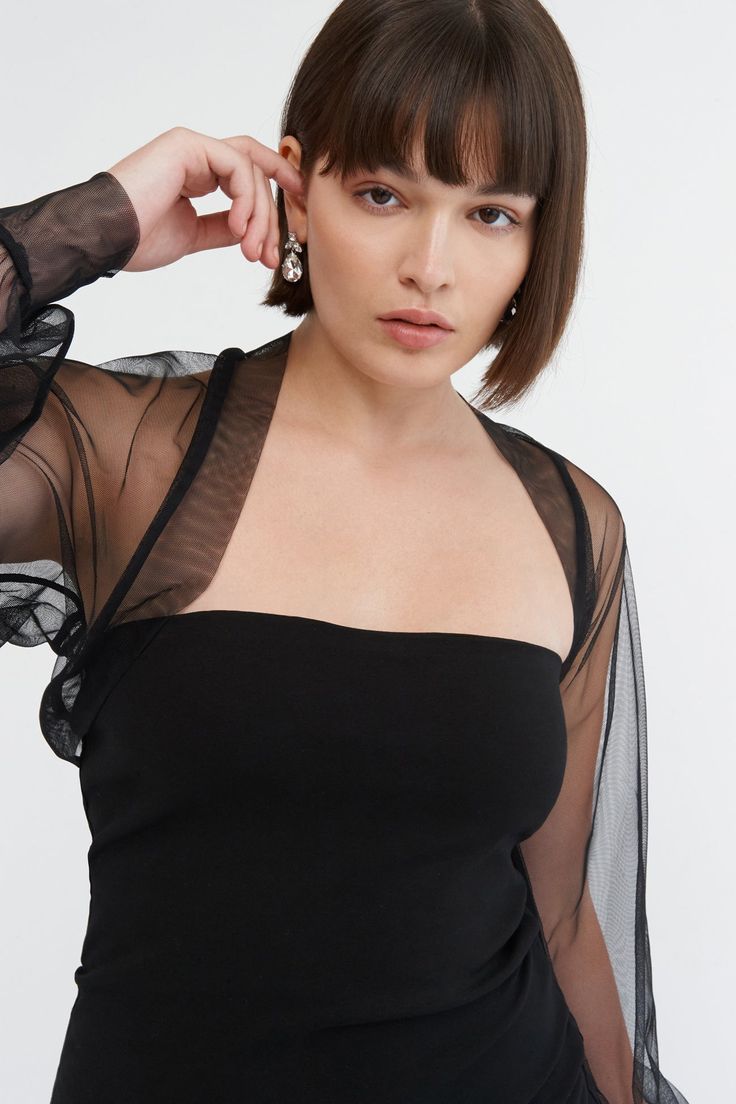 Light and airy, soft against the skin, our Olympia Bolero is a sheer bolero of pure glamour. Fashioned from premium European mesh, her Juliette sleeves gather to a fitted cuff for a truly romantic silhouette, while accent seams in the back add an edgy elegance to officially go with everything in your closet. This mesh bolero shrug’s THE piece to take your night-out outfit to the next level.[SPLIT] Natalee, in black, is 5'10" (178 cm) tall, wearing size M. Sam, in off white, in dusty pink, in ros Going Out Winter Outfits, Going Out Outfits Summer, Summer Going Out Outfit, Brunch Outfits Fall, Mesh Bolero, Night Out Outfit Clubwear, Ladies Brunch, Romantic Silhouette, Bolero Top