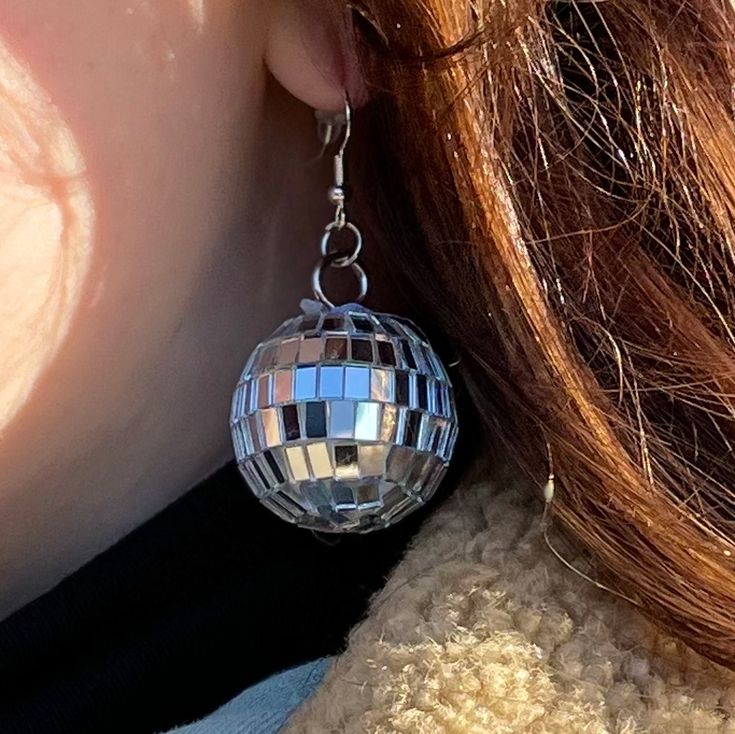 ".: 1.25\" Disco Ball Earrings .: Sterling Silver Hooks Our Camel Walk Disco Ball Earrings are the perfect accessory for you to \"Strut Your Stuff\" at Madison Square Garden for Phish New Years." Mirror Ball Earrings, Disco Ball Jewelry, Disco Ball Headband, Mirror Ball Outfit, Disco Ball Makeup, Mirrorball Earrings, 70s 80s Party, Disco Accessories, Folklore Outfit