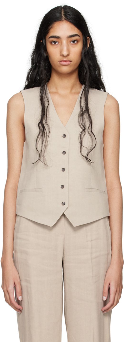 Stretch linen- and viscose-blend canvas vest. · V-neck · Button closure · Welt pockets · Partial satin lining Supplier color: Sand Monogram Vest, Canvas Vest, Cotton Vest, Color Sand, Anine Bing, Quilted Vest, Suit Vest, Sleeveless Vest, Knit Vest