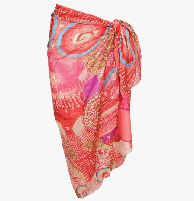 Wrap up in style with this embroidered sarong. Perfect for sunny beach days or balmy summer nights, this lightweight fabric is sure to keep you cool and looking boho chic. With this sarong in your wardrobe, you'll be ready for your next (fabulous) adventure! Lush colors of red, orange, fuchsia, turquoise, and purple. 3' H x 6'L Embroidered, Cotton, Boho Sarong 100% Cotton Made in India Cold wash with dark colors or alone, hang dry. Lush colors of red, orange, fuchsia, turquoise, and purple. Fashion Basics, Beach Sarong, Beach Wrap, Wrap Around Skirt, Turquoise And Purple, Maxi Gown Dress, Sunny Beach, Sweater Tank Top, Beach Days