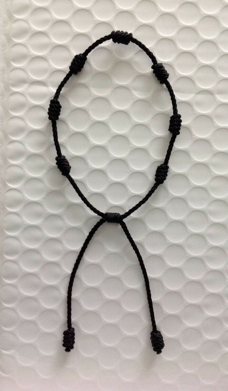 Lucky black string bracelet Kabbalah Amulet 7 Knots Protection Rope man or woman. Shipped with USPS First Class Types Of Thread Bracelets, Different Knots For Bracelets, Adjustable Cord Choker For Festival, Black Casual Necklace With Adjustable Cord, Casual Black Necklace With Adjustable Cord, Adjustable Choker As Gift, Adjustable Choker For Gift, Adjustable Choker As A Gift, Adjustable Choker For Gifts