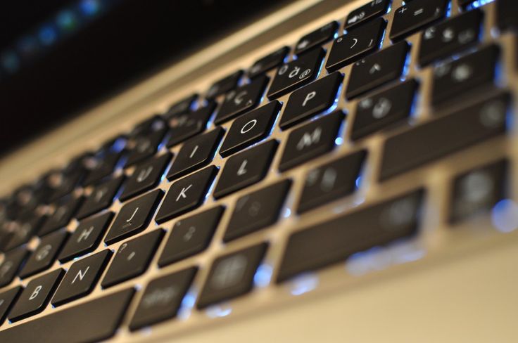 a close up view of the keys on a laptop computer's backlit keyboard