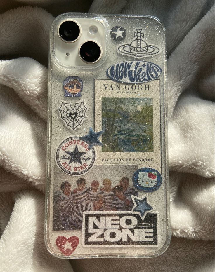 an iphone case with various stickers on it