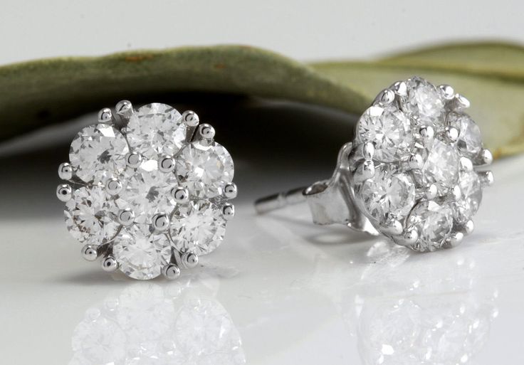 Exquisite 1.60 Carats Natural VVS Diamond 14K Solid White Gold Stud Earrings Amazing looking piece! Suggested Replacement Value $5,800.00 Total Natural Round Cut Diamonds Weight: 1.60 Carats (both earrings) VS1-VS2 / G-H Diameter of the Earring is: 9mm Total Earrings Weight is: 2.1 grams Disclaimer: all weights, measurements and colors are approximate and may vary slightly from the listed dimensions or as seen in the image. All pictures are magnified to show the smallest of details. Please, refe Luxury Round Cut Cluster Earrings For Anniversary, Luxury Oval Cluster Earrings For Anniversary, Luxury Cluster Earrings For Anniversary, Luxury Cluster Earrings With Vvs Clarity For Anniversary, Luxury Vvs Clarity Cluster Earrings For Anniversary, Luxury Cluster Earrings With Prong Setting For Anniversary, Oval Brilliant Cut Cluster Earrings For Anniversary, Gia Certified Fine Jewelry Cluster Earrings For Wedding, Oval White Gold Cluster Earrings For Anniversary