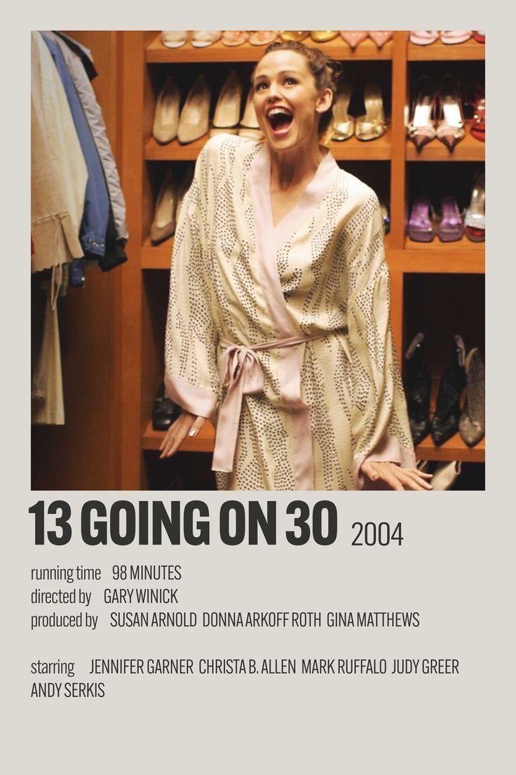 a woman in a dressing room with shoes on shelves and an advertisement for the magazine 13 going on 30