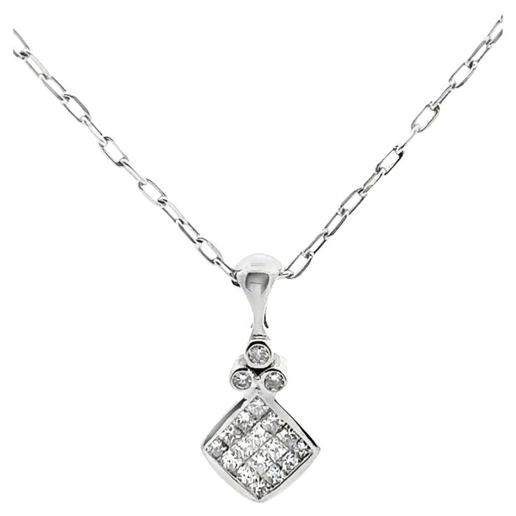 14K white gold " invisibly set” pendant with 16 princess cut diamonds weighing 1.3 carats total and three round brilliant cut diamonds weighing 0.15 carat total. * The pendant slides on a 20 inch 14K white gold paperclip chain weighing 5.9 grams. Pearl Diamond Pendant, White Gold Pendant Necklace, Vintage Pendant Necklace, Modern Necklaces, Trombone, Solitaire Pendant, Yellow Gold Pendants, Diamond Pendant Necklace, Princess Cut Diamonds