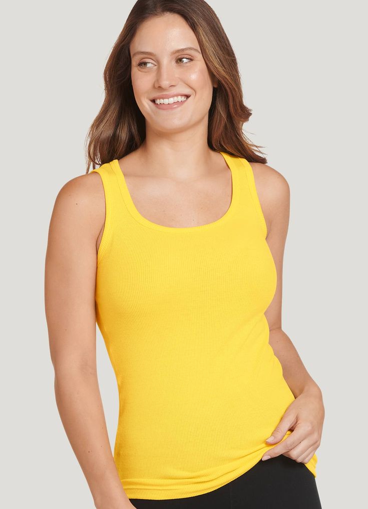 Sleeping, lounging, or working out just feels better in the Jockey® 100% Cotton Rib Tank. Breathable 100% cotton feels soft against skin, helping you stay comfortable whether you're on the move or relaxing. | Jockey® 100% Cotton Rib Tank Top in Morning Star Soft Cotton Tops, Comfortable Cotton Summer Activewear, Stretch Cotton Activewear For Relaxation, Solid Cotton Tank Top With Moisture-wicking, Solid Cotton Moisture-wicking Tank Top, Solid Moisture-wicking Cotton Tank Top, Comfortable Stretch Cotton Activewear, Basic Solid Cotton Tank Top, Supportive Activewear For Relaxation