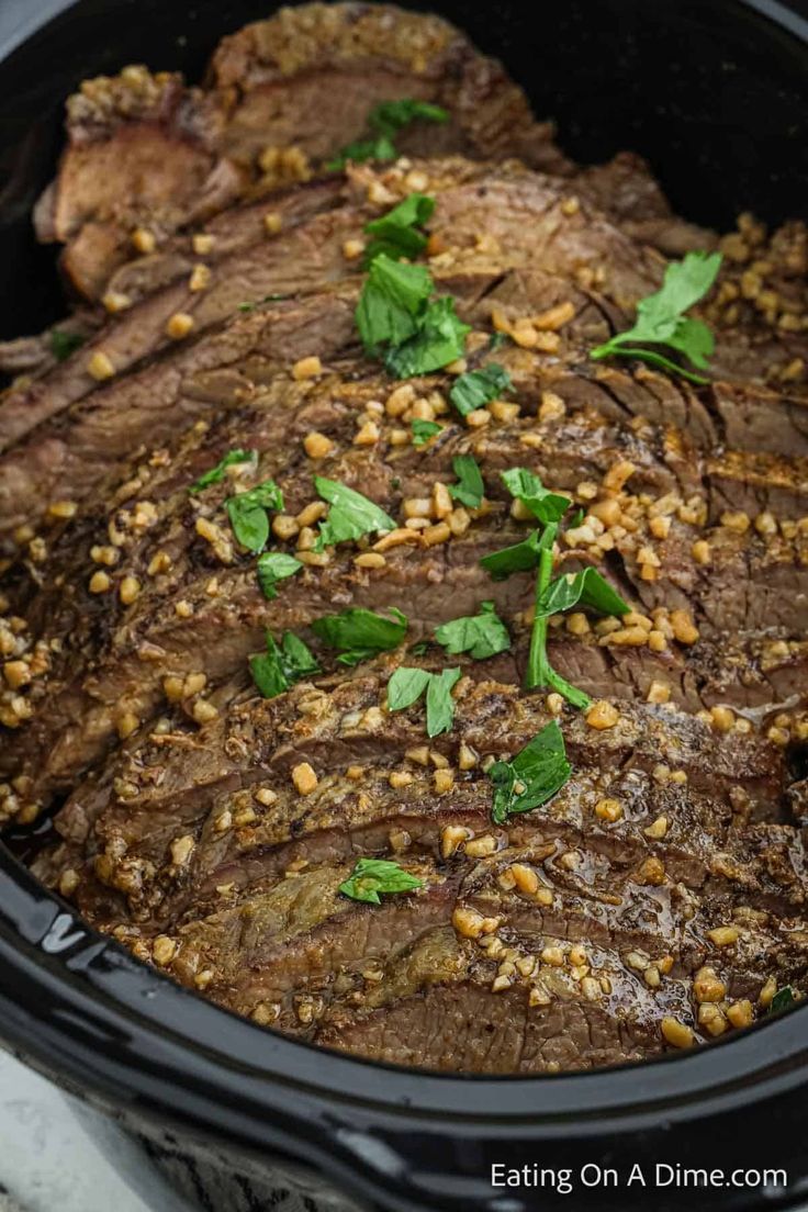 the meat is cooked and ready to be served in the crock pot for dinner