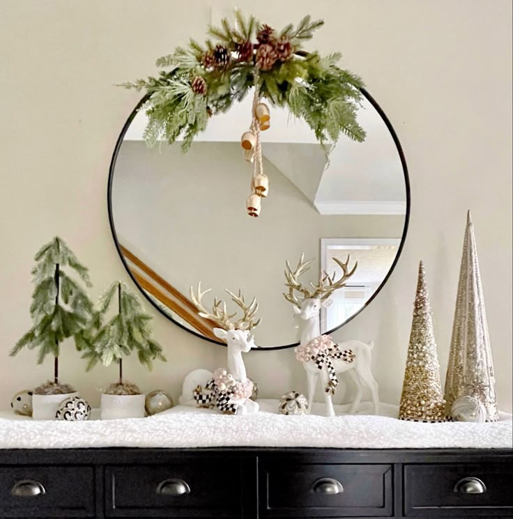 Console table with neutal christmas decor Christmas Decoration Console Table, Christmas Decor On Console Table, Simple Entryway Christmas Decor, Christmas Decor On Entry Table, Christmas Decor Ideas Buffet Table, Christmas Decor Ideas With Mirrors, Christmas Decor On Round Table, Christmas Decorations Console Table, Modern Christmas Console Table Decor