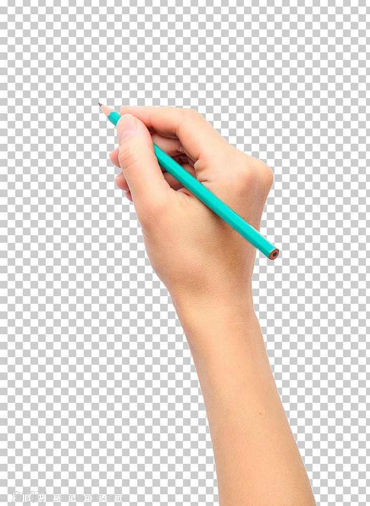 a woman's hand holding a green pencil and writing something on the other side