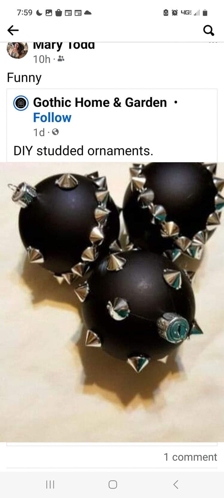 three black balls with spikes on them sitting on a table