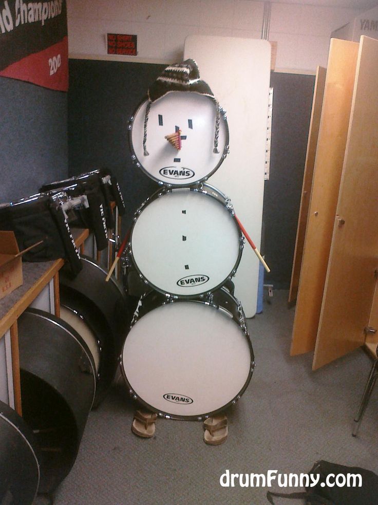 a drum set up in the middle of a room