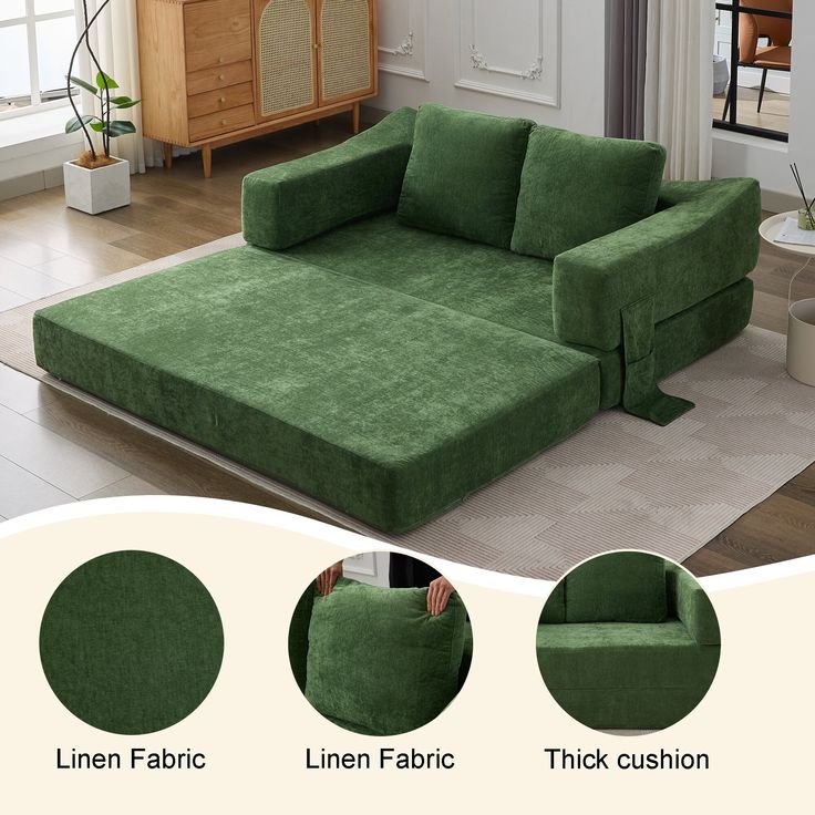 an image of a living room setting with green couches and rugs on the floor