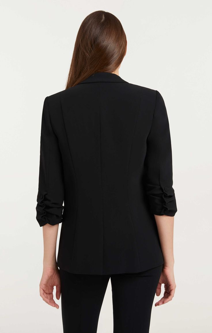 Look polished and professional in this Crepe Khloe Blazer. This expertly tailored piece features a collared neckline, notched lapels, and stylized sleeves for a look that is modernly classic. The classic black color will have you standing out with sophisticated style. Make a powerful statement with this must-have blazer. Details One button closureFabric: Drapey CrepeFaux front pocketsBack ventThree-quarter sleeves Content and Care 69% Triacetate 31% PolyesterDry Clean Only Imported Measurements Look Polished, Crepe Blazer, Short Loungewear, Mens Fall, Pant Shirt, Black Blazers, Sophisticated Style, Swimwear Tops, Sweater Jacket