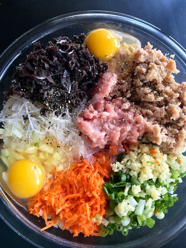 an image of a plate of food that includes eggs, meat and veggies