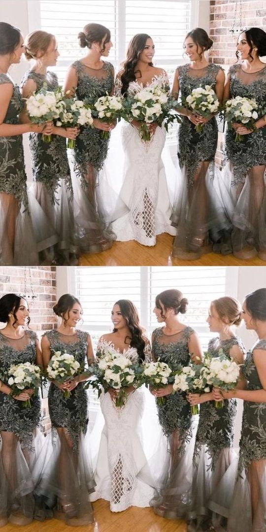 the bridesmaids are holding their bouquets and posing for pictures in front of a window