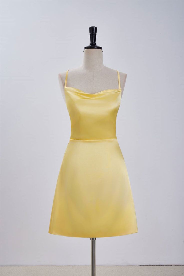 Expertly crafted from satin fabric, this stunning A-line dress boasts a striking cowl neck and delicate spaghetti straps. The back features a lace-up design, while the above knee length adds a touch of elegance to the overall silhouette. Available in a vibrant yellow hue, this dress is sure to make a statement. Item #NP1113 Material: Satin Color: Yellow Silhouette: A-line Embellishment: Cowl neck Neck: Spaghetti straps Back: Lace-up Length: Above knee length Fully lined: Yes Built-in bra: Yes True to size. Made in China. Dresses are usually packed inside out for protection. Hand wash Summer Satin A-line Dress With Fitted Bodice, A-line Evening Slip Dress With Adjustable Straps, Evening A-line Slip Dress With Adjustable Straps, A-line Slip Dress With Adjustable Straps For Evening, Spring Elegant Satin Suspender Dress, Elegant Satin Suspender Dress For Spring, Bridesmaid Dresses With Satin Finish And Spaghetti Straps, Formal Satin Dress With Sweetheart Neckline For Summer, Elegant Satin Dress With Adjustable Straps