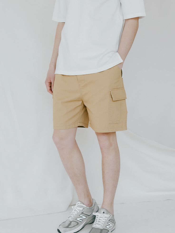 Editor's NotesThese cotton twill based cargo banding shorts are perfect for the warmer seasons. It features double stitching at the waist to prevent shrinking or shape change. The multiple pockets make the shorts efficient to wear.- Double stitch at the waist- Multiple pockets- Draw string / elastic waistband- Twill woven fabricMeasurements(in.)M / L / XL- Total Length: 16.54 in. / 16.93 in. / 17.32 in. - Waist: 12.99 in. / 13.78 in. / 14.57 in. - Thigh: 12.20 in. / 12.60 in. / 12.99 i Khaki Utility Cargo Shorts With Patch Pockets, Utility Style Short Cargo Pants In Beige, Beige Utility Cargo Shorts With Cargo Pockets, Beige Short Utility Cargo Pants, Utility Khaki Cargo Shorts, Utility Khaki Shorts With Cargo Pockets, Beige Utility Cargo Style Shorts, Beige Cotton Cargo Shorts With Patch Pockets, Beige Short Cargo Pants With Cargo Pockets