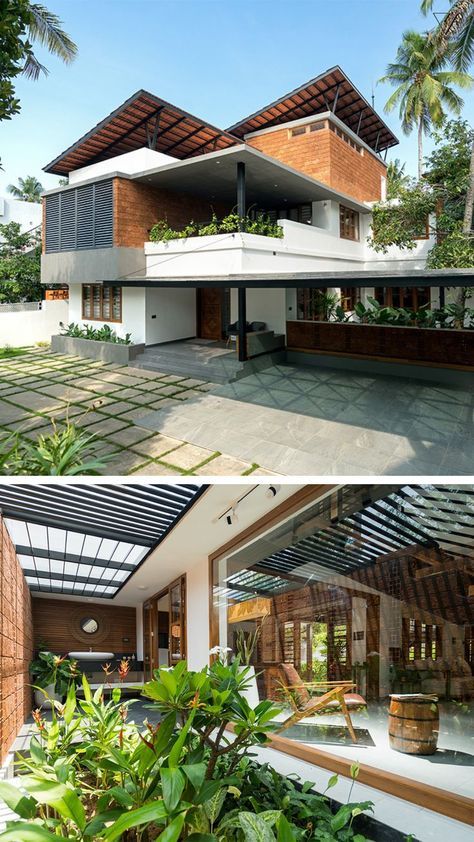 this modern house is surrounded by tropical trees and greenery