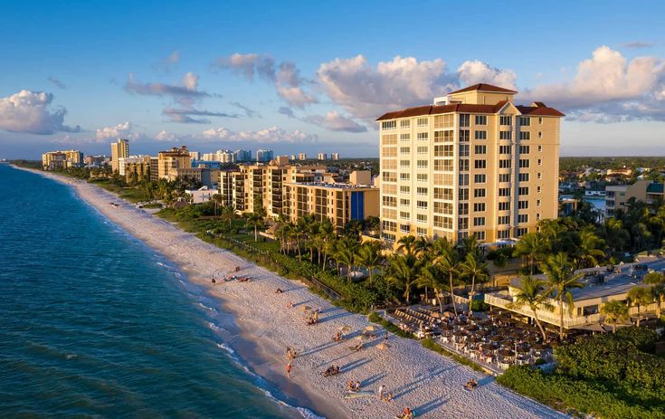 an aerial view of the beach and hotels