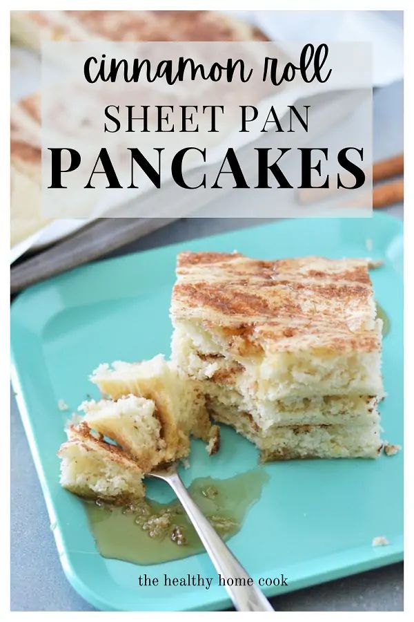 cinnamon roll sheet pan pancakes on a blue plate