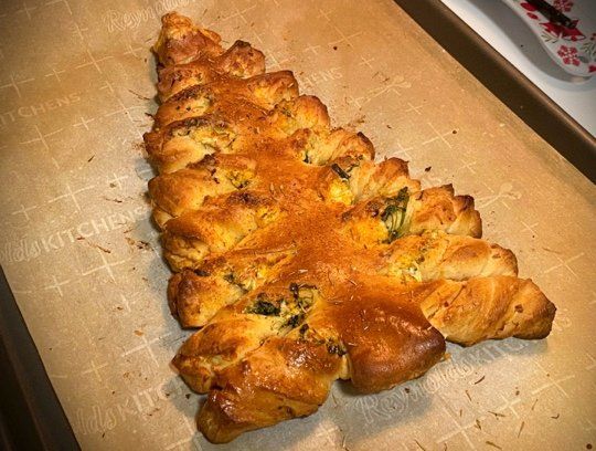 a piece of bread sitting on top of a baking sheet