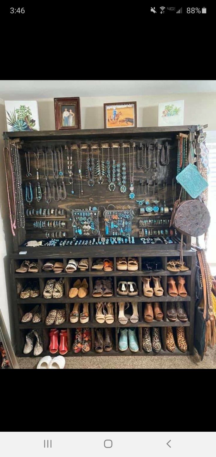 the shoe rack is filled with many pairs of shoes