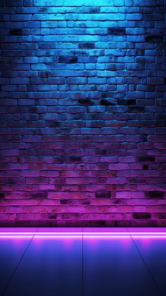 a brick wall with purple and blue lights