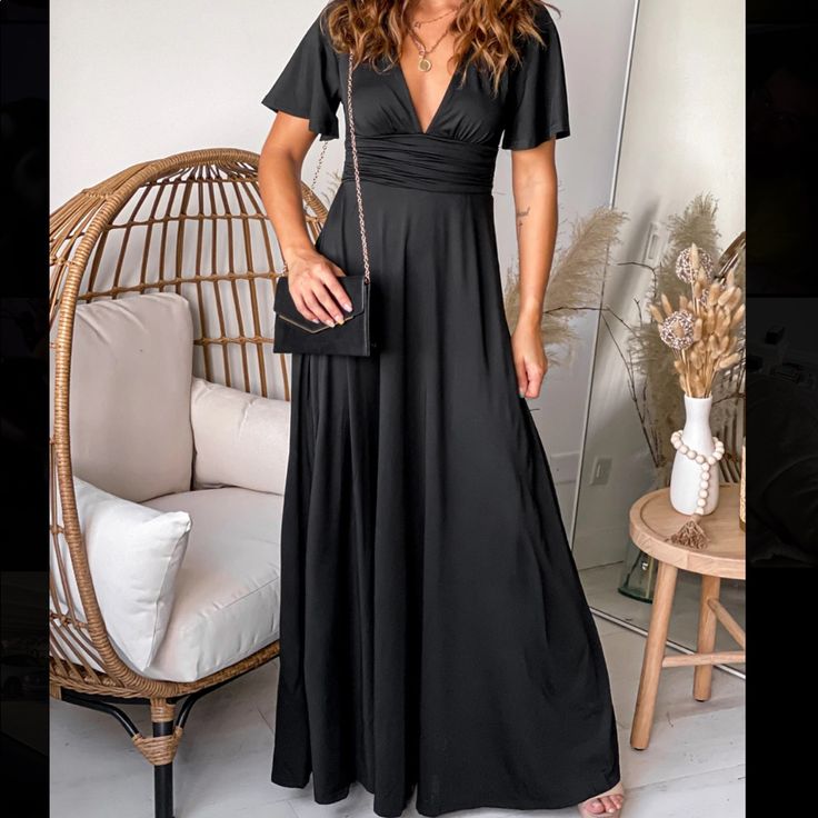 Brand New, Never Worn Black V-Neck Maxi Dress With Short Sleeves. Black V-neck Dress For Date Night, Chic Black V-neck Dress With Surplice Neckline, Black V-neck Maxi Dress For Date Night, Black A-line Maxi Dress For Night Out, Casual Fitted V-neck Dress For Evening, Elegant Solid Color V-neck Dress For Formal Occasions, Elegant V-neck Formal Dress In Solid Color, Chic Maxi Length V-neck Dress In Solid Color, Chic Black A-line V-neck Dress