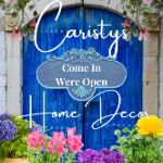 a blue door with flowers in front of it and the words causty's come in we're open home