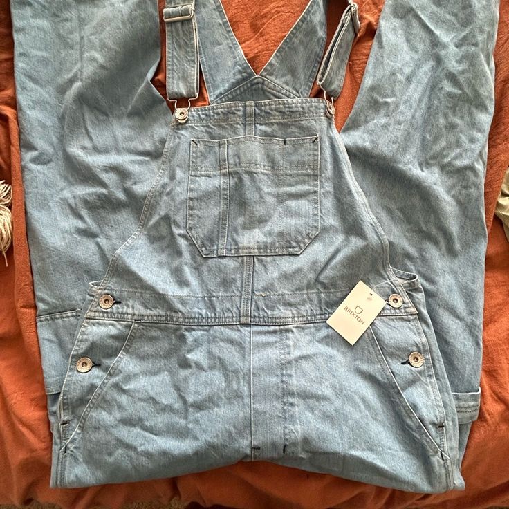 Brixton Bootcut Overalls New With Tags Light Wash Denim Workwear Overalls, Light Wash Denim Overalls For Work, Spring Utility Light Wash Jeans, Denim Overalls With Relaxed Fit, Workwear Medium Wash Overall Bottoms, High Rise Washed Blue Denim Overalls, Workwear Medium Wash Overalls, Denim Overalls In Medium Wash, Light Wash Denim Overalls For Fall