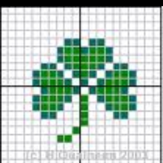 the four leaf clover cross stitch pattern is shown in green, white and black squares