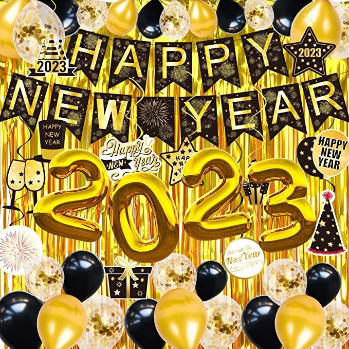 a happy new year party with balloons and streamers in gold, black and white