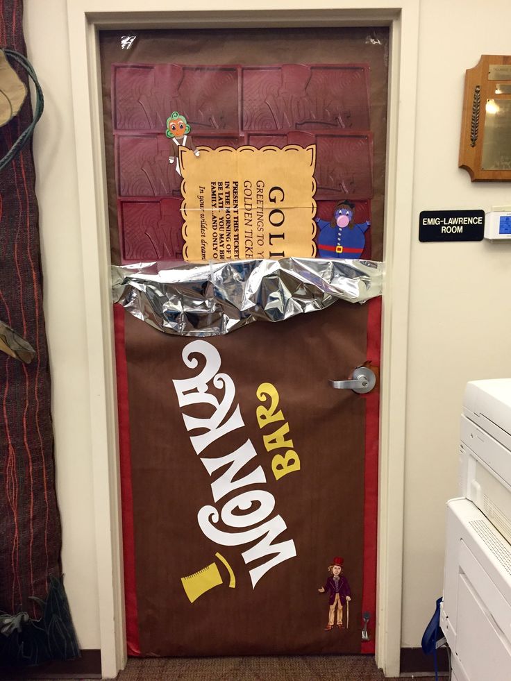 a door decorated to look like it is going out of the oven with some tin foil on it