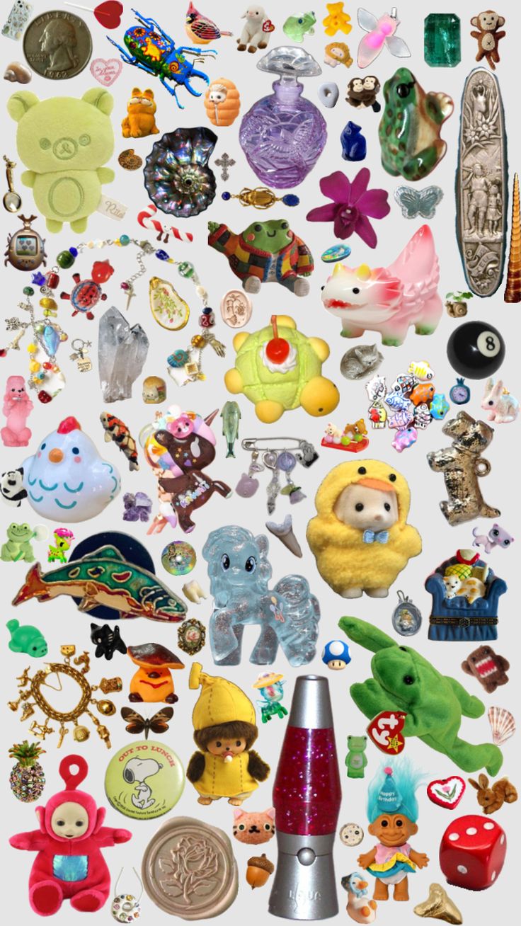 many different types of toys and magnets on a white background, including an object that looks like a bottle