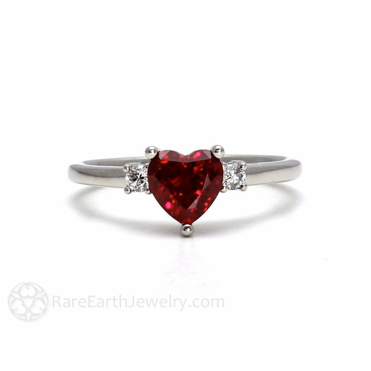 Ruby Ring Ruby Engagement Ring Heart Promise Ring 3 Stone Diamonds 14K or 18K Gold Red Gemstone Ring July Birthstone by RareEarth on Etsy https://www.etsy.com/listing/200970205/ruby-ring-ruby-engagement-ring-heart Fine Jewelry Three Stone Rings For Proposal, Wedding Ring With Lab-created Ruby In Heart Cut, Red Three-stone Diamond Promise Ring, Wedding Ring With Heart Cut Lab-created Ruby, Heart Cut Lab-created Ruby Wedding Ring, Red Heart Cut Diamond Promise Ring, Red Three-stone Diamond Ring For Anniversary, Red Three Stone Diamond Promise Ring, White Gold Ruby Ring For Anniversary On Valentine's Day