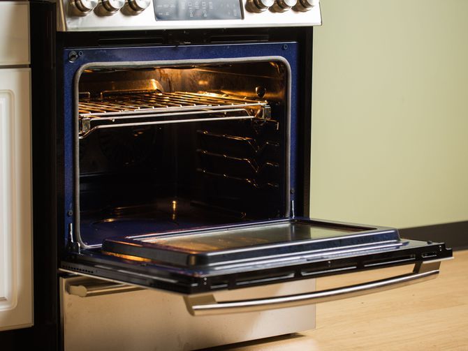 an oven with the door open and it's light on