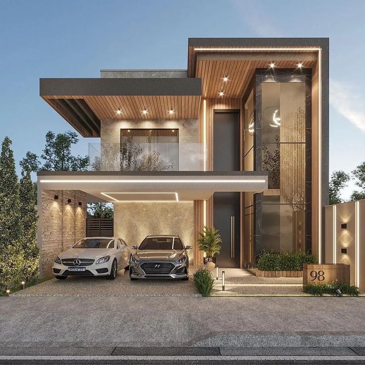 two cars parked in front of a modern house