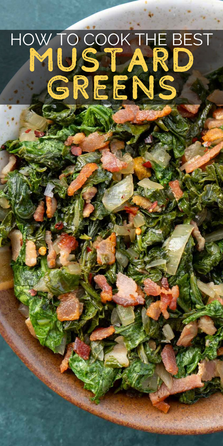 a white bowl filled with greens and bacon on top of a blue tablecloth next to a