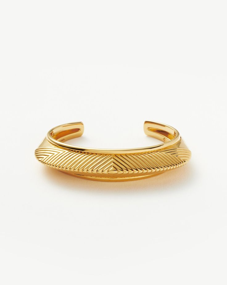 Hera Dome Ridge Statement Cuff Bracelet | 18ct Gold Plated. A Capsule of Sculptural Modern-Day Amulets. This Statement Chunky Cuff Bracelet Features Geometric Ridge Detailing and a Pyramid Profile. Textures and Geometric Patterns Combine to Signify Intuition, Inner Knowing, and Creativity. Available in Small, Medium and Large, Style Solo or Pair with a Double Chain for an Instant Arm Stack. Metal: 18Ct Recycled Gold Plating on Brass S: Fit Guidance – Fits Wrist Up to 155mm Dimensions: H: 42mm W: Chunky Cuff Bracelet, Arm Stack, Inner Knowing, Statement Cuff Bracelet, Finger Bracelets, Gold Bracelet Cuff, Double Chain, Gold Plated Bracelets, Amulets