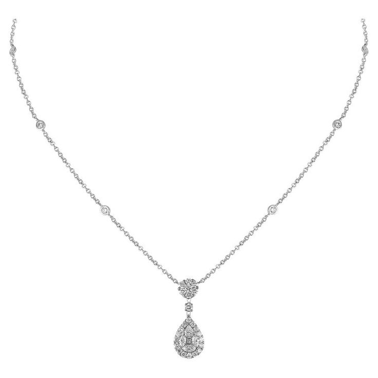 A timeless pendant that is set with round and marquise cut diamonds demonstrating the exceptional quality, this multi-cut diamond pendant is an elegant design that is perfect for both daywear and eveningwear, suspended from a fine 18 karat white gold chain. 18 Karat White Gold Diamond (Total Carat Weight: 1 ct) Color and clarity: F, VVS Weight: 5.31 g Pendant size: 43 cm White Gold Pendant, White Gold Chains, Marquise Cut Diamond, Marquise Cut, Drop Necklace, White Gold Diamonds, Diamond Pendant, Gold Pendant, Gold Chain